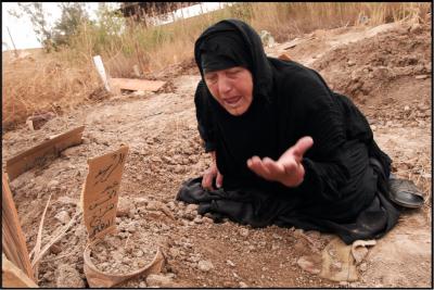 Mother Grieves the Death of a Loved One, Iraq